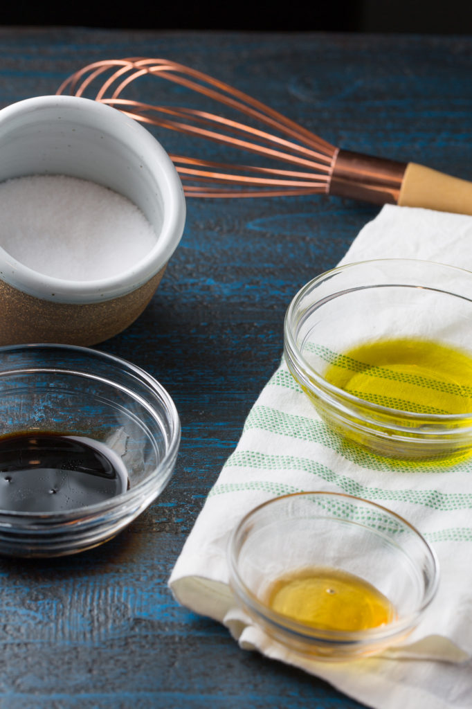 Homemade vinaigrette ingredients for simple spinach salad