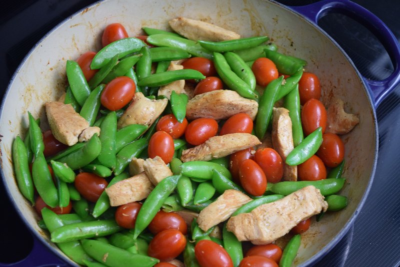 saute snow peas grape tomatoes and chicken breast