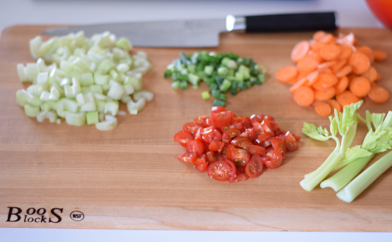 chopped veggies on boos board