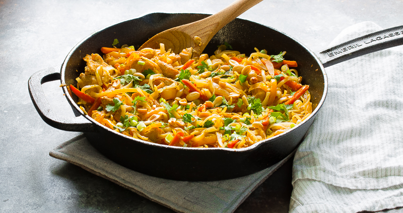 homemade pad thai in cast iron skillet