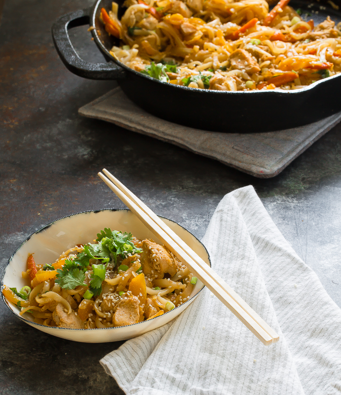 pad thai in bowl with chopsticks