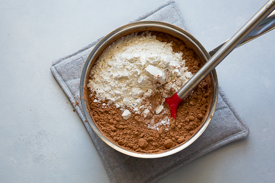 flour and cocoa to make brownie batter