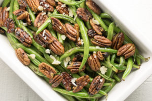 sauteed green beans with curried pecans