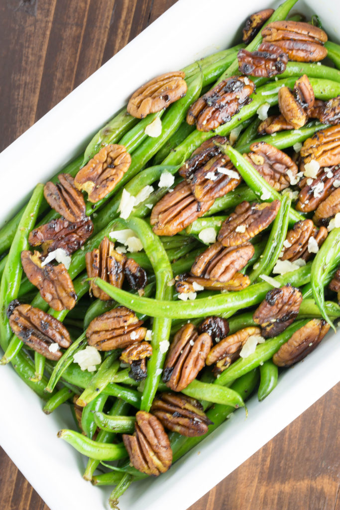 sautéed green beans with curried pecans #greenbeans #thanksgivingrecipes deliciouslyplated.com