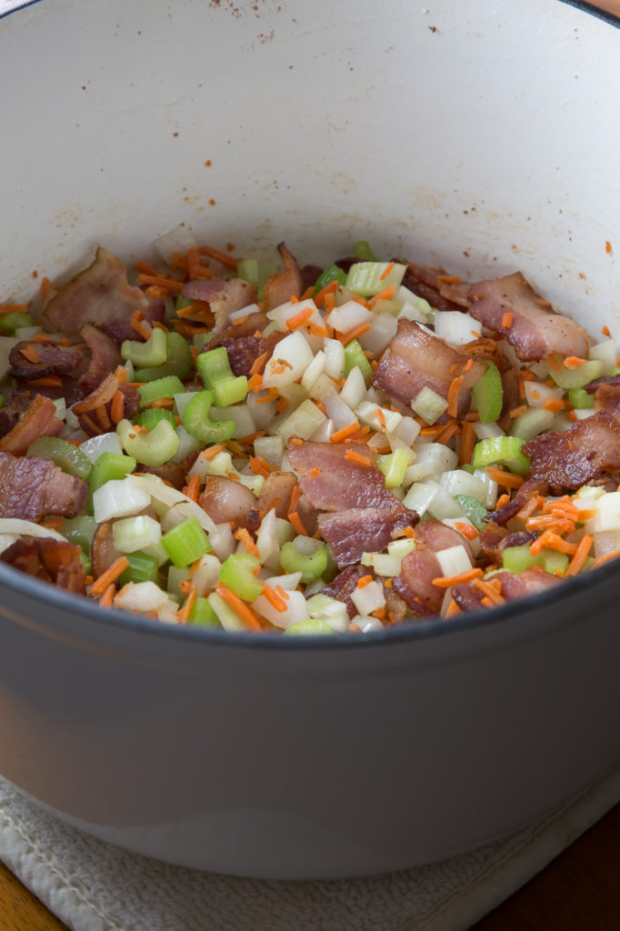 Bean and Bacon soup ingredients in a dutch oven