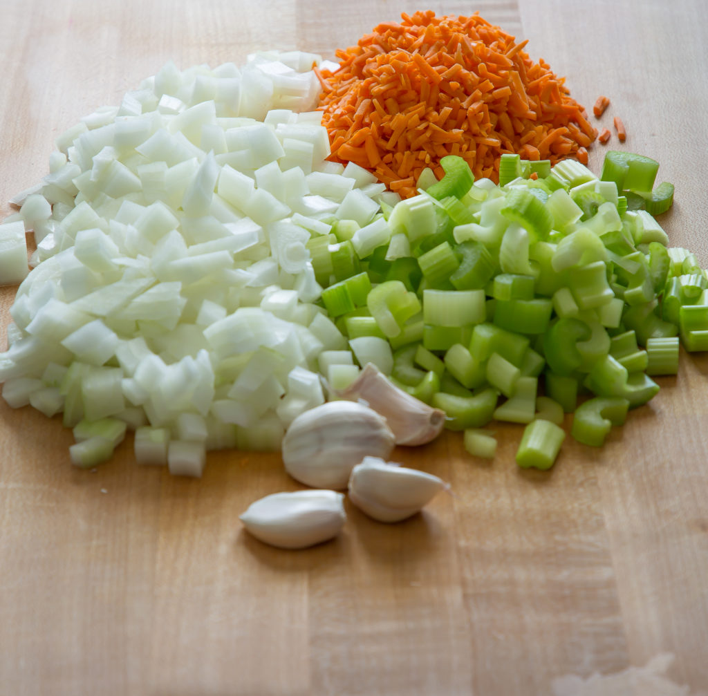 diced onions, carrots, celery, and garlic cloves
