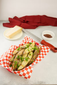 Broasted potato wedges in a basket