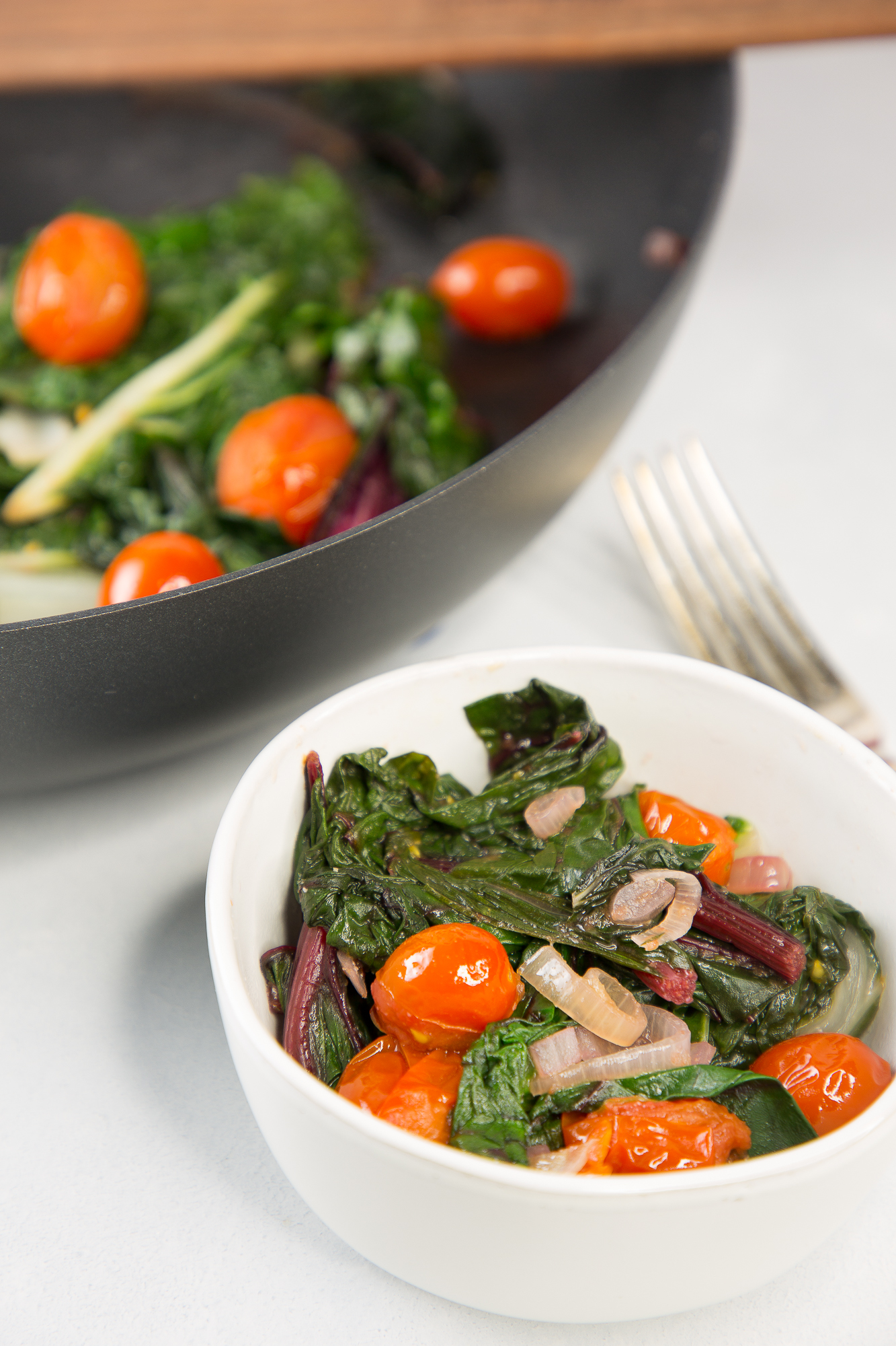 bowl of Sautéed Chard with tomatoes and shallots