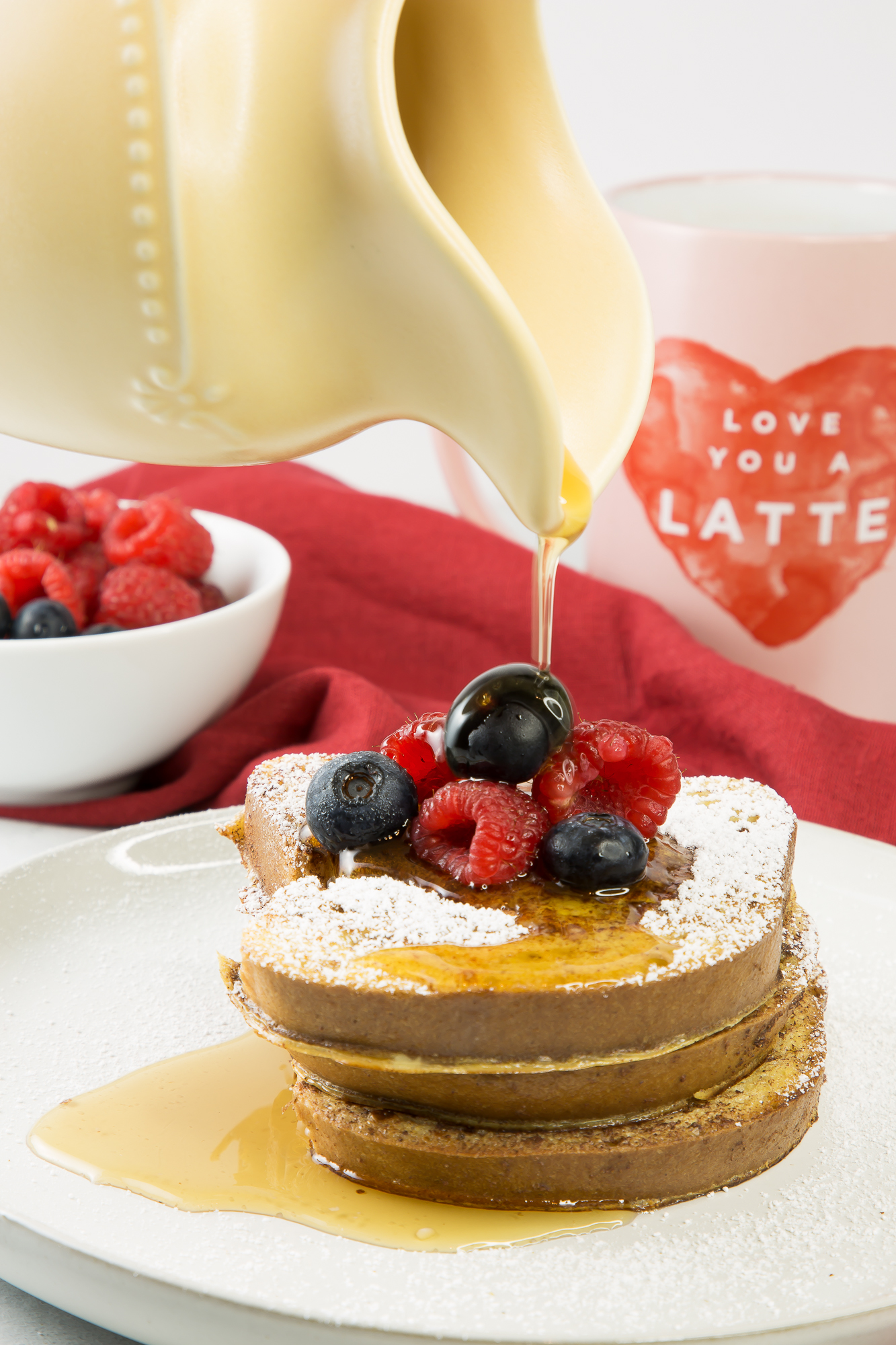 Gluten free french toast with maple syrup and fresh berries