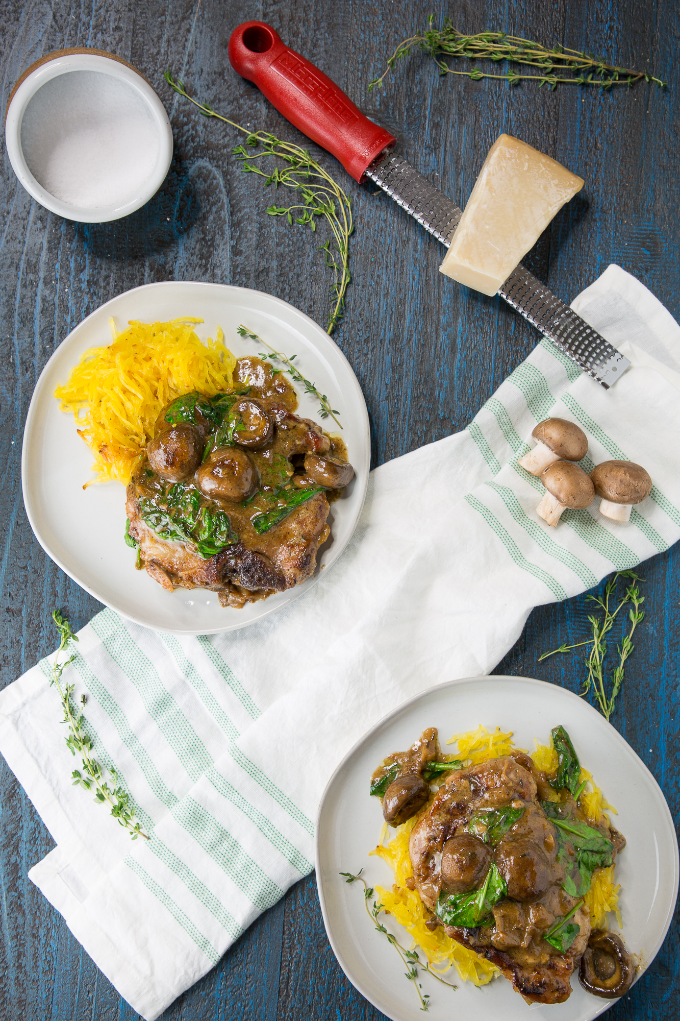 plates of pork chops with mushroom gravy