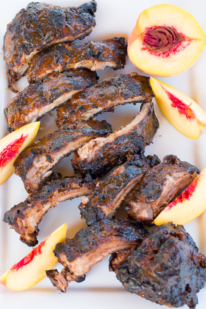 Bourbon peach grilled ribs on a platter