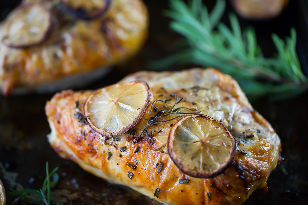 A Baked Lemon Rosemary Chicken Recipe You Are Going To Love - Deliciously Plated