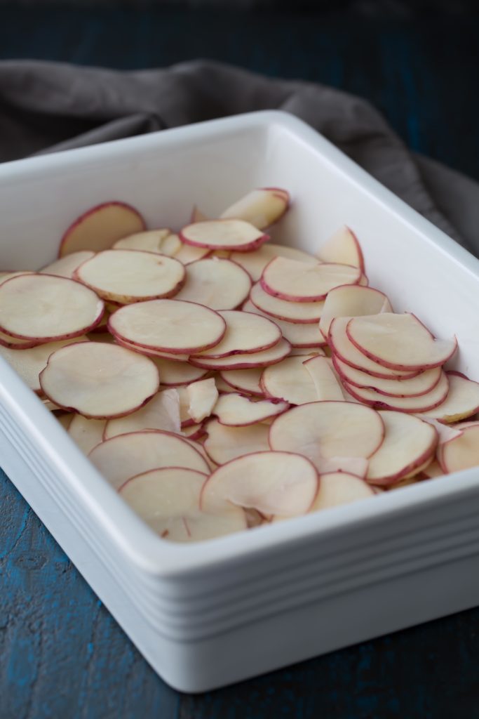 thinly sliced potatoes for cheesy scalloped potatoes