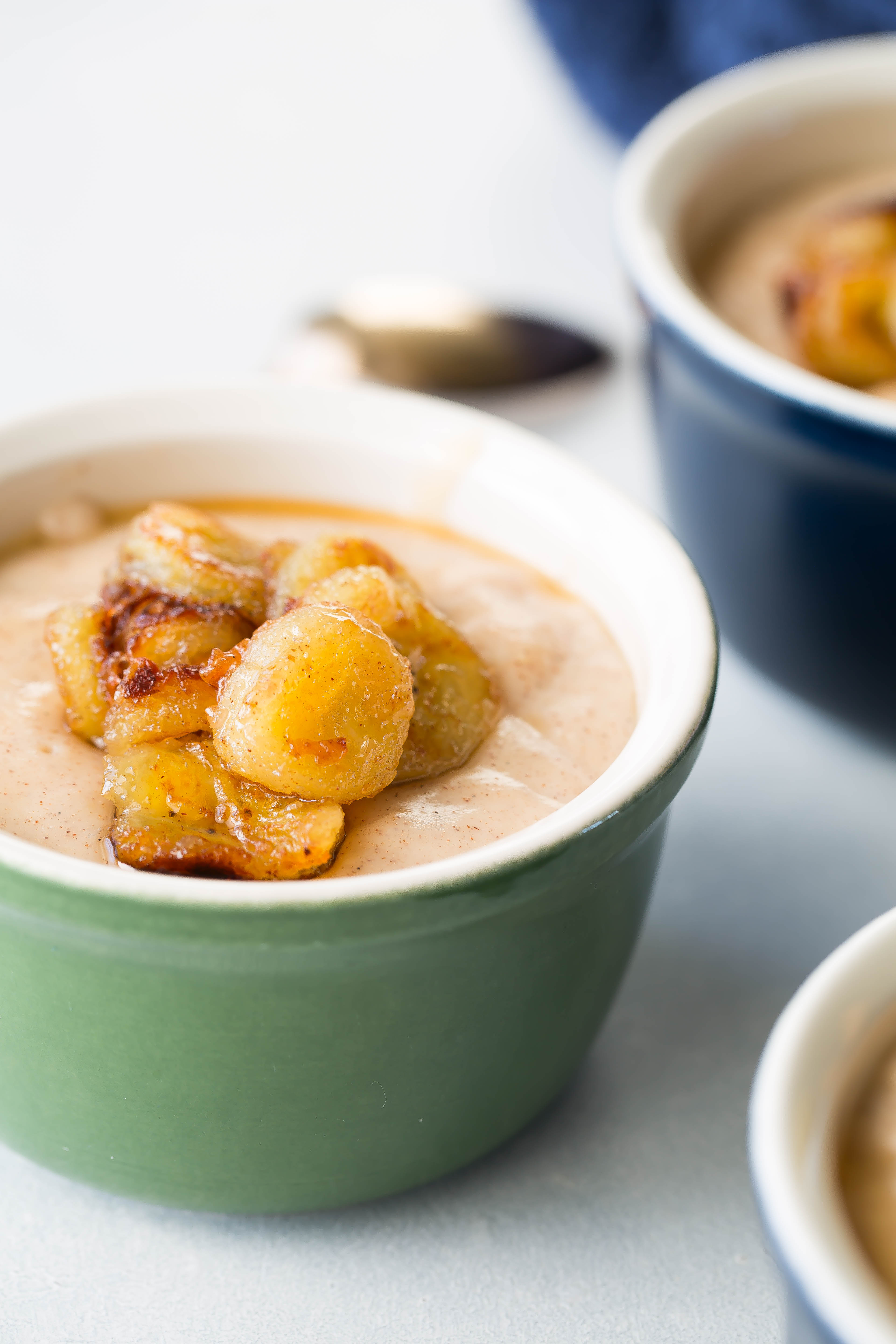 Honey and Cinnamon Pudding with Caramelized Bananas - Deliciously Plated